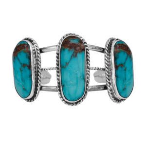 Vintage sterling silver Native American oval turquoise station cuff bracelet.