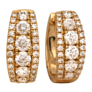 New 14k yellow gold huggie hoop earrings set with 0.96 carats of round brilliant earth-mined diamonds.