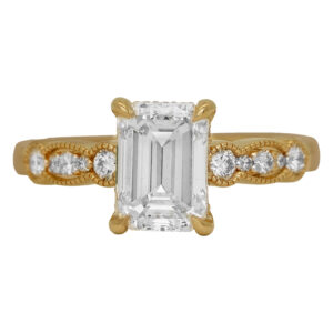 New 14k yellow gold under halo engagement ring set with a 2.00 carat lab-grown emerald cut diamond plus 0.37 carats of lab-grown round brilliant diamonds.