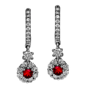New 18k white gold halo earrings set with 0.26 carats of round brilliant rubies plus 0.59 carats of round brilliant earth-mined diamonds.