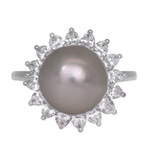 Vintage platinum halo ring set with an white South Sea pearl plus 2.20 carats of pear earth-mined diamonds.