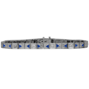 Antique 14k white gold bracelet set with 0.40 carats of old European cut earth-mined diamonds plus triangle lab-grown sapphires.