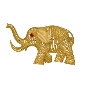 Vintage 14k yellow gold elephant brooch set with a ruby eye.