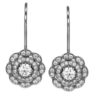 New 18k white gold Hearts On Fire Lorelei halo earrings set with 0.70 carats of round brilliant earth-mined diamonds.