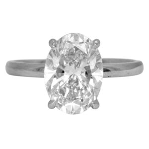 New 14k white gold solitaire engagement ring set with a 3.02 carat lab-grown oval diamond.
