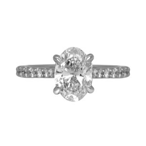 New 14k white gold engagement ring set with a 1.50 carat lab-grown oval diamond plus 0.31 carats of lab-grown round brilliant diamonds in the band.