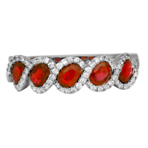 New 14k white gold halo band set with 1.20 carats of oval rubies plus 0.20 carats of round brilliant earth-mined diamonds.