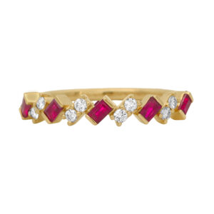 New 14k yellow gold band set with 0.31 carats of emerald cut rubies and 0.14 carats of round brilliant earth-mined diamonds.