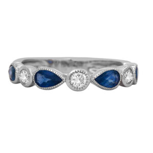 New 14k white gold band set with 1.34 carats of pear blue sapphires plus 0.24 carats of round brilliant earth-mined diamonds.