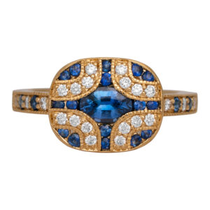 New 14k yellow gold ring set with 0.90 carats of oval and round brilliant blue sapphires plus 0.25 carats of round brilliant earth-mined diamonds.