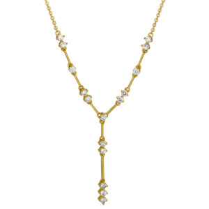 New 14k yellow gold lariat necklace set with 0.65 carats of round brilliant earth-mined diamonds on an 18" chain.