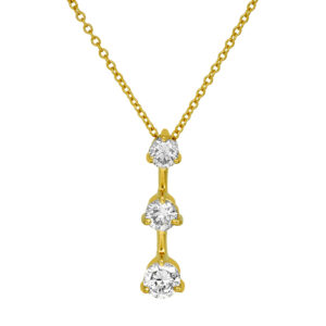 Vintage 14k yellow gold pendant set with 0.75 carats of round brilliant earth-mined diamonds on a 16" cable chain.