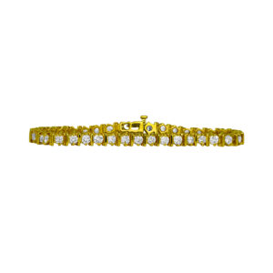 Vintage 14k yellow gold tennis bracelet set with 4.32 carats of round brilliant earth-mined diamonds with a safety clasp.