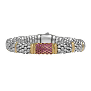 Vintage sterling silver and 18k yellow gold Lagos caviar bracelet set with round brilliant pink sapphires.