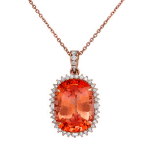 New 18k rose gold halo pendant set with an 18.80 carat cushion morganite plus 0.83 carats of round brilliant earth-mined diamonds on a 16" cable chain.