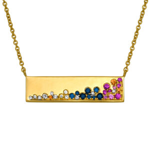 New 14k yellow gold bar pendant set with 0.44 carats of round brilliant multicolor sapphires plus 0.04 carats of round brilliant earth-mined diamonds on an 18" cable chain.