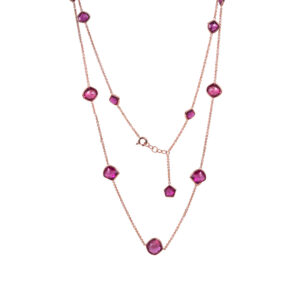 Vintage 14k rose gold station necklace set with 88.00 carats of fancy shaped rubellite on a 39" chain.