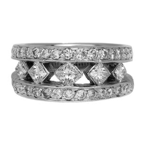 Vintage 18k white gold ring set with 2.00 carats of round brilliant and princess earth-mined diamonds.