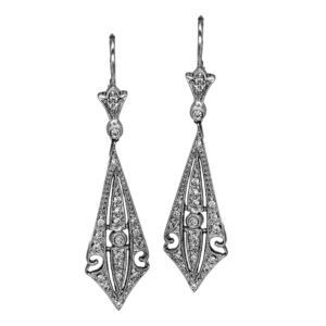 Vintage 14k white gold earrings set with 0.20 carats of round brilliant earth-mined diamonds.
