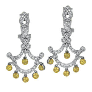 Vintage 14k white & yellow gold chandelier earrings set with 0.40 carats of round brilliant earth-mined diamonds plus 0.28 carats of round brilliant yellow earth-mined diamonds.