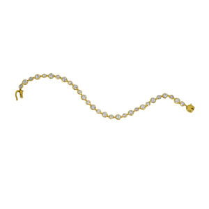 New 14k yellow gold tennis bracelet set with 7.00 carats of round brilliant earth-mined diamonds.