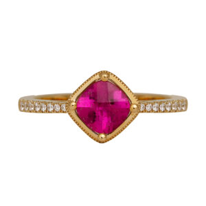 New 14k yellow gold ring set with a 0.88 carat cushion pink tourmaline plus 0.12 carats of round brilliant earth-mined diamonds.