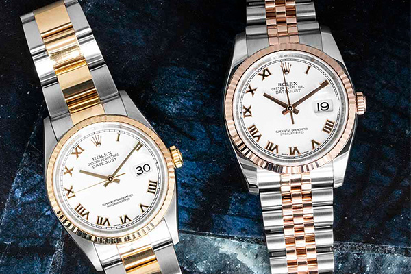 a close up image of two rolex datejust watches