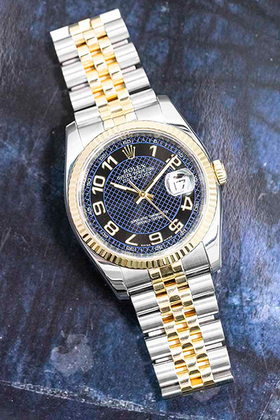 a close up image of a rolex datejust watch