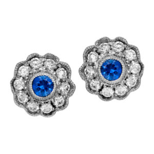 New 14k white gold flower halo earrings set with 0.32 carats of round brilliant blue sapphires plus 0.30 carats of round brilliant earth-mined diamonds.