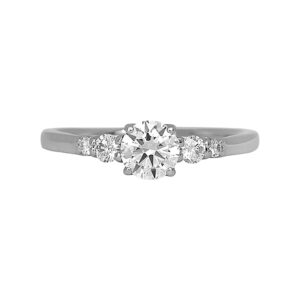 Vintage 18k white gold engagement ring set with a 0.50 carat round brilliant earth-mined diamond plus 0.18 carats of round brilliant earth-mined diamonds.
