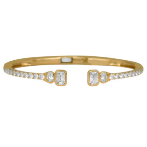 New 14k yellow gold bangle set with 3.46 carats of lab-grown round brilliant, oval, and emerald cut diamonds.
