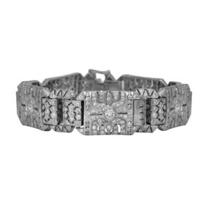 Vintage 18k white gold bracelet set with 7.00 carats of round brilliant earth-mined diamonds.