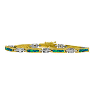 Vintage 14k yellow and white gold bracelet set with 0.40 carats of round brilliant earth-mined diamonds plus opal inlay.