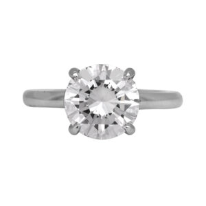 New 18k white gold engagement ring set with a 3.07 carat round brilliant earth-mined diamond plus 0.08 carats of round brilliant earth-mined diamonds in the hidden-halo.