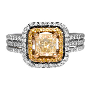 Vintage 18k white and 24k yellow gold double halo engagement ring set with a 0.80 carat radiant fancy yellow earth-mined diamond plus 0.51 carats of round brilliant earth-mined diamonds plus 0.18 carats of yellow round brilliant earth-mined diamonds.
