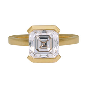 New 14k yellow gold solitaire engagement ring set with a 3.06 carat asscher cut lab-grown diamond.